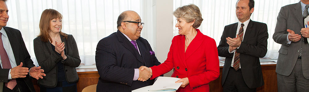 HE Sheikh Mohamed Bin Issa Al Jaber and UNESCO Director-General Mrs Irina Bokova sign an agreement at UNESCO Headquarters on 7 February 2013